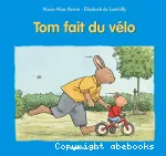 Tom fait du vélo